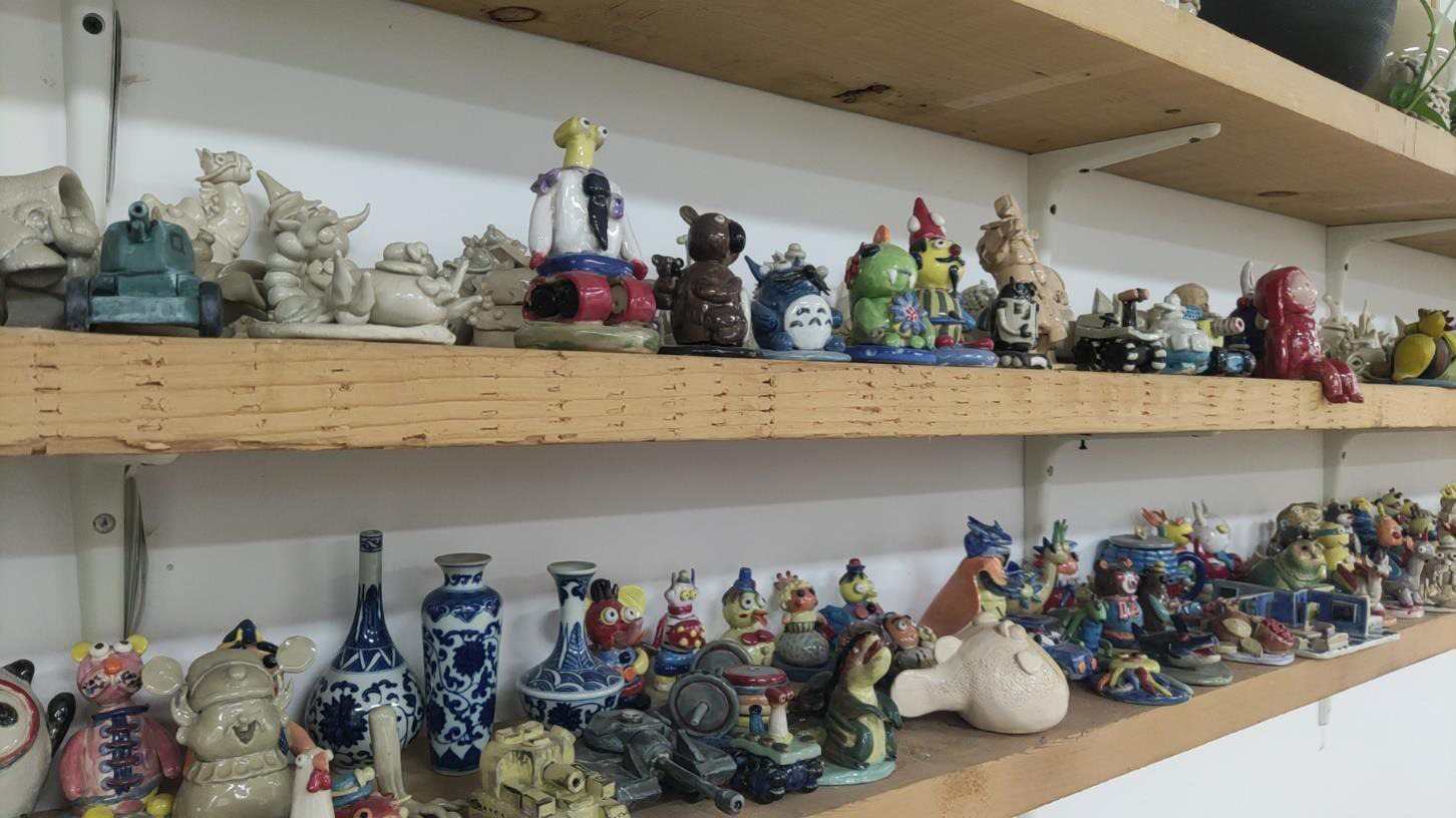 Wall of student pottery work at Sheshan Kiln